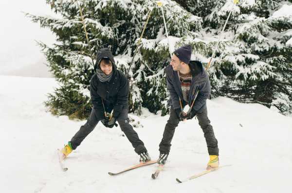 Two cross-country skiers in snow