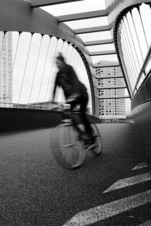 Bike driving over a bridge