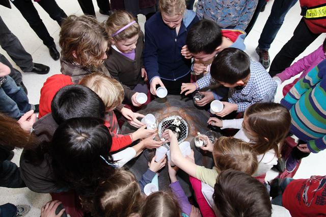 Children looking at minerals